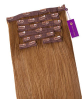 A set of Straight Classic Clip-In Hair Extensions from Perfect Locks in Golden Brown, with clips along the top and a purple tag on the right.#color_golden-brown-(6)