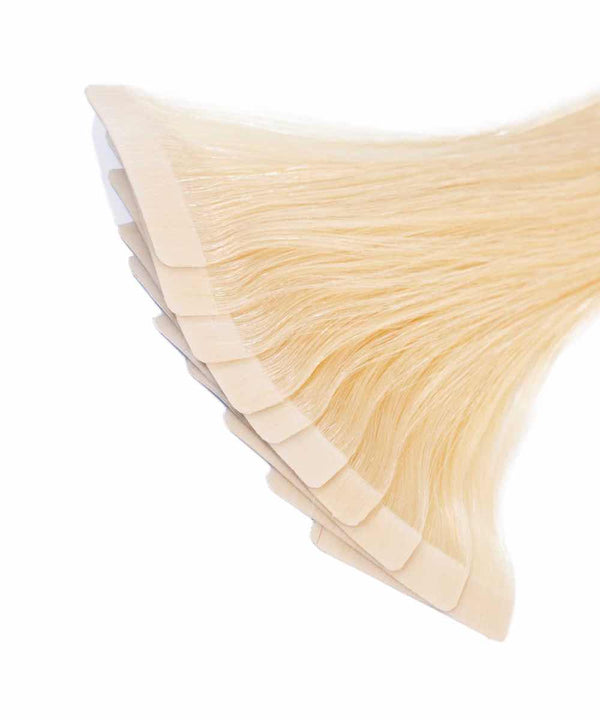 platinum blonde (613) straight tape in hair extensions by Perfect Locks