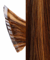Close-up of Perfect Locks Straight Classic Tape-In Hair Extensions in warm mocha lowlights, adhesive tape tabs left, smooth strands right.#color_warm-mocha-lowlights-(2/4/6)