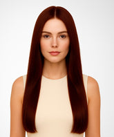 A woman with long, straight Dark Auburn hair in a Straight U-Part Wig and fair skin wears a sleeveless beige top, facing the camera with a neutral expression against a plain white background.#color_dark-auburn-(33)