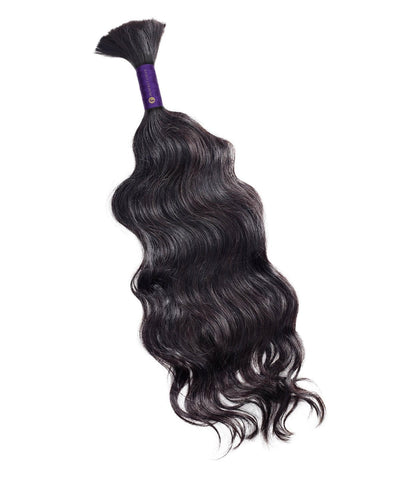 A bundle of wavy bulk hair extensions for braiding, displayed against a white background.