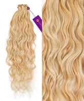 Perfect Locks Wavy Hand-Tied Weft Rows (2oz) in Natural Black  on white background, soft wavy texture, purple tag attached.#color_caramel-blonde-highlights-(24/27/613)