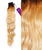 Perfect Locks Wavy Hand-Tied Weft Rows in Toffee Blonde Highlights (4/27) with dark roots, honey blonde ends, wavy ombre texture.#color_rooted-toasted-blonde-(2/613)