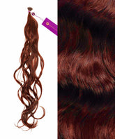 A bundle of Perfect Locks Wavy Fusion I-Tip Hair in Dark Auburn with tag, beside a close-up of shiny, wavy strands.#color_dark-auburn-(33)