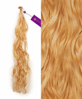 Two images: left shows Perfect Locks Wavy Fusion I-Tip Hair in Honey Blonde with a purple tag; right is a close-up of its soft, wavy texture and shiny honey blonde color.#color_honey-blonde-(27)