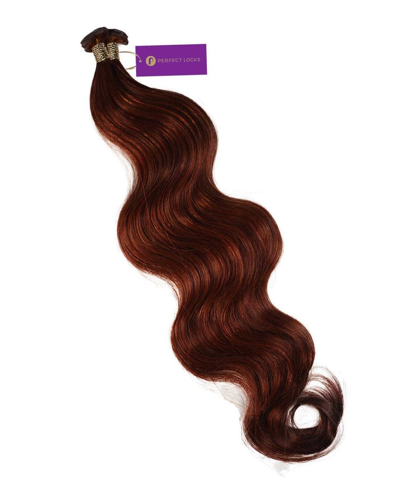 A bundle of long, wavy, dark auburn  Wavy Hybrid Weft Hair Extensions by Perfect Locks with a purple tag at the top.