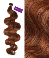 Perfect Locks Wavy Hybrid Weft Hair Extensions in Champagne Highlights (18A/60), long wavy strands with purple tag, close-up showing shiny, smooth texture and vibrant color.#color_golden-brown-(6)