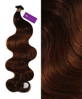 On the left, Perfect Locks Wavy Hybrid Weft Hair Extensions in Chocolate Brown are shown. On the right, a close-up highlights the glossy, natural-looking texture and rich brown shade of these Remy human hair extensions.#color_rooted-chocolate-golden-brown-(2/6)
