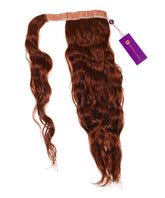 The Perfect Locks Wavy Clip-In Ponytail Extension in Dark Auburn has a sewn-in strip at the top and a purple tag on the right.#color_dark-auburn-(33)