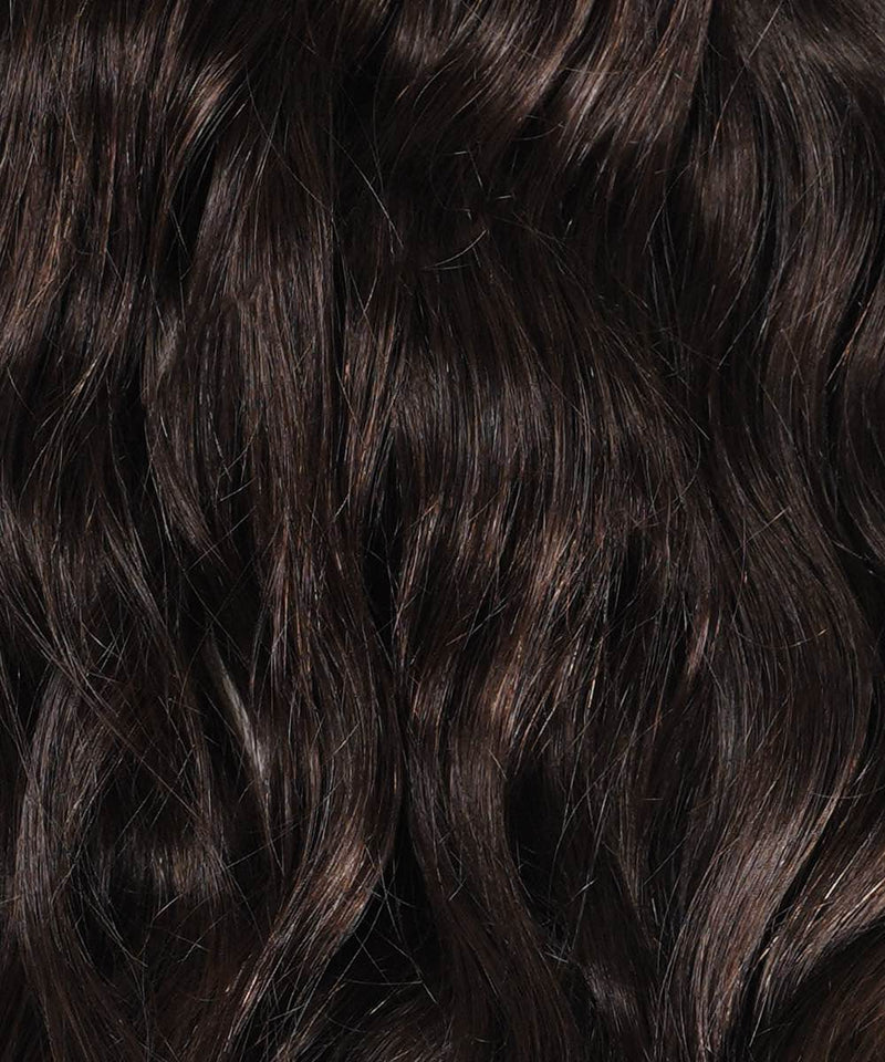 Close-up of Perfect Locks Wavy Clip-In Ponytail Extensions in Chocolate Brown , with glossy, long waves, natural texture, and subtle highlights.