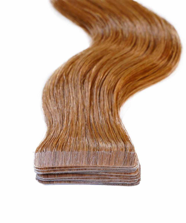golden brown (6) wavy tape in hair extensions by Perfect Locks