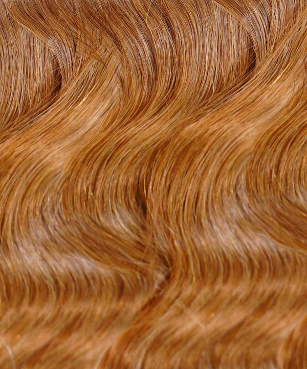 golden brown (6) wavy tape in hair extensions by Perfect Locks
