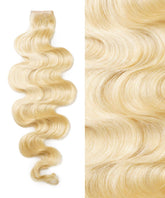 On the left is Perfect Locks' Wavy Seamless Tape In Weft in Platinum Blonde ; the right shows a close-up of its smooth, shiny waves.#color_platinum-blonde-(613)