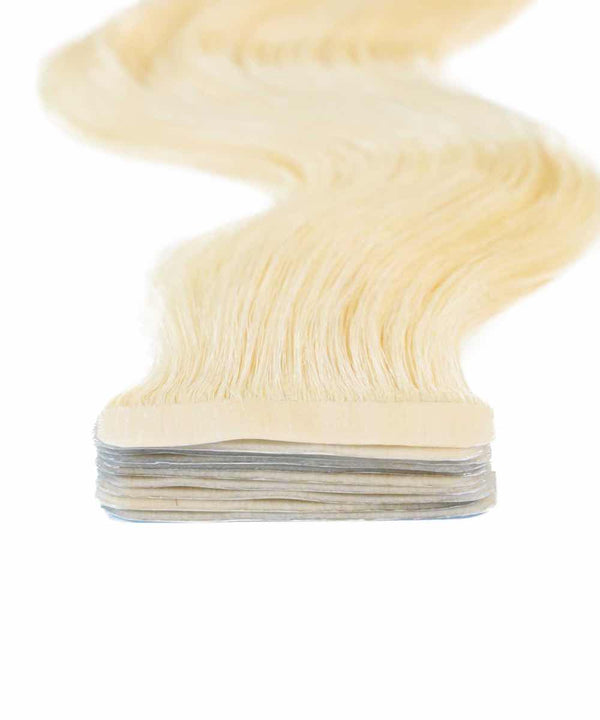 platinum blonde (613) wavy tape in hair extensions by Perfect Locks