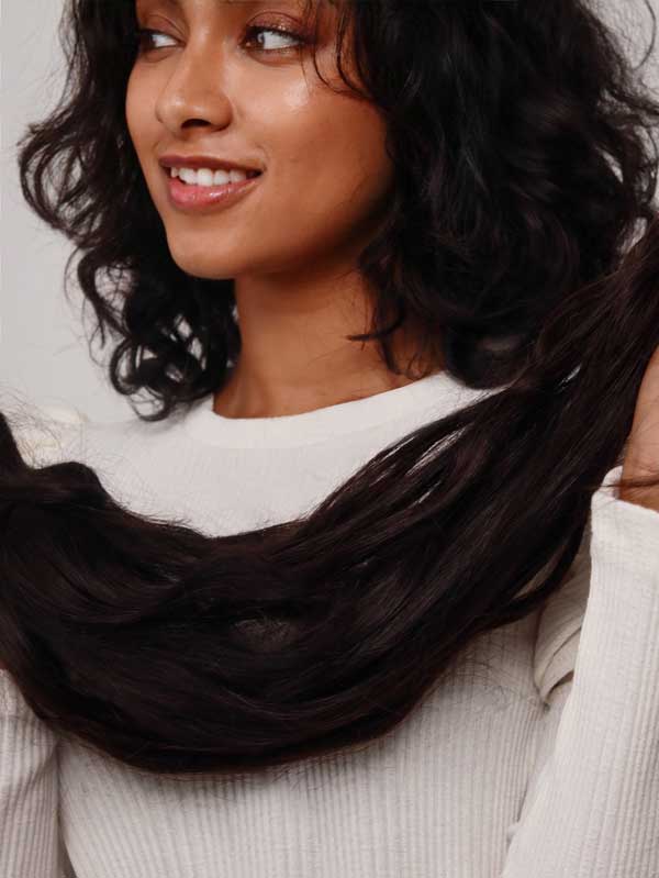 Indian Woman Holding Hair Extensions