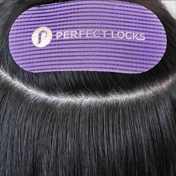 Step 1: Section hair.Create a clean section where your weft will be placed.