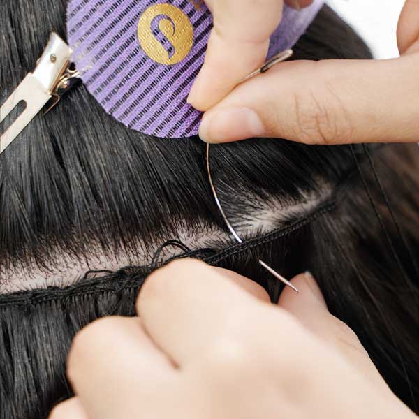 Step 4: Sew to foundation. Sew the machine weft to the foundation to attach the weft to the hair.