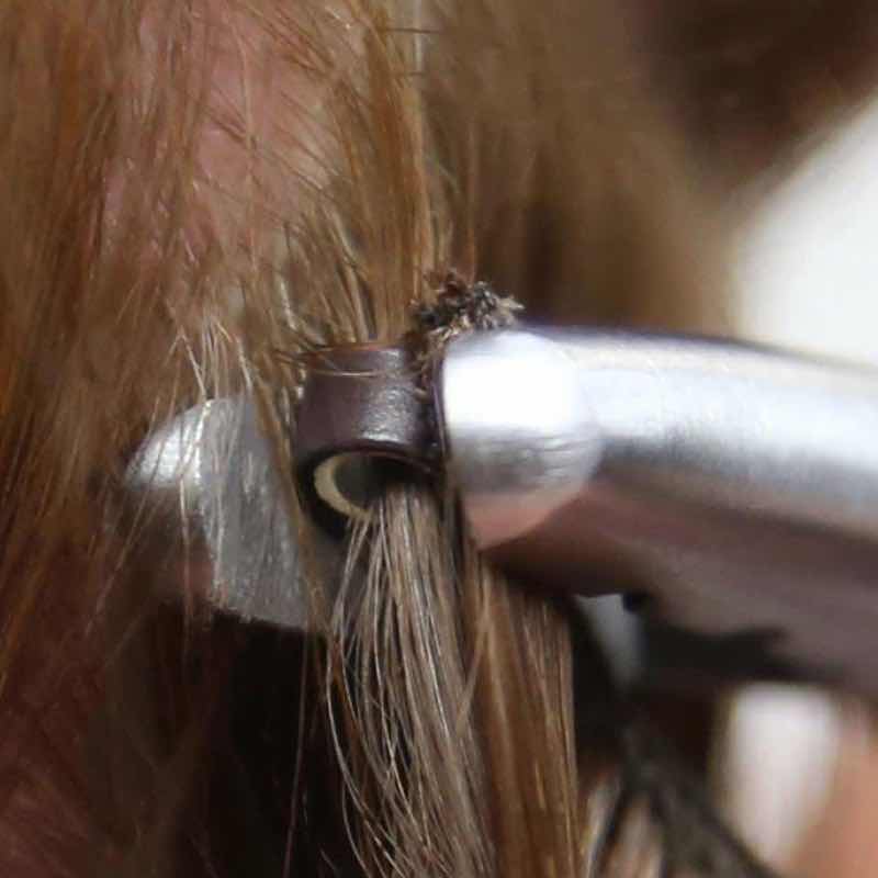 Step 4: Clamp the bead. Close the bead down with pliers. Ensure that the weft and bead lay flat to the sc...