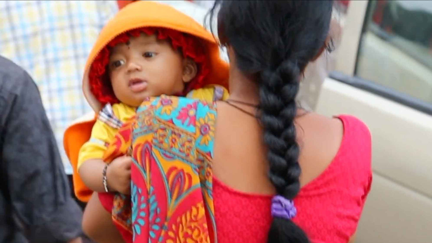 Indian Woman at Templle with Baby