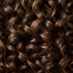Medium brown curly hair extension texture