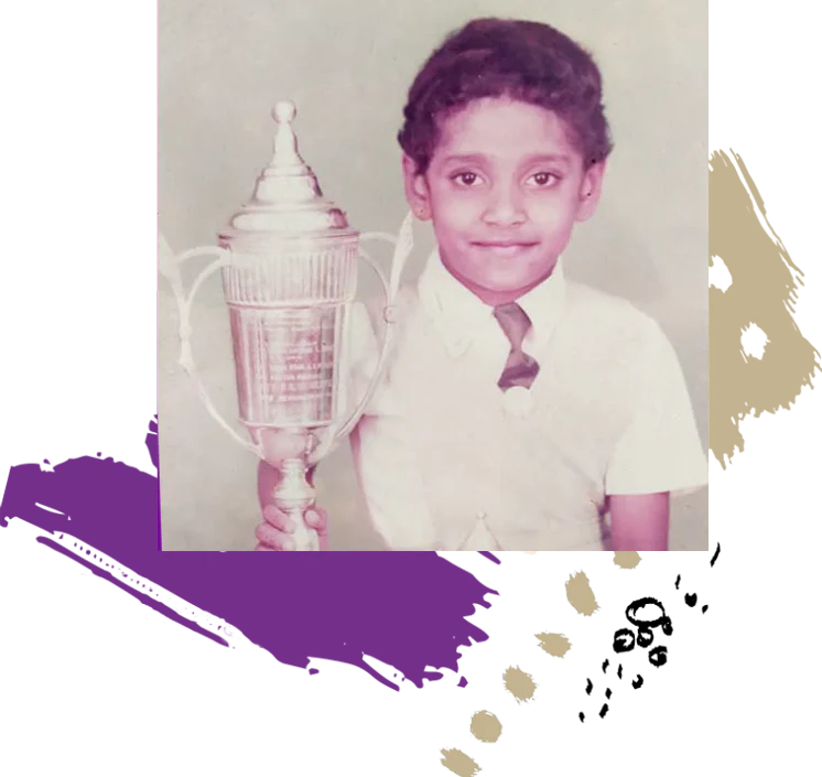 A young boy in a school uniform smiles while holding a large trophy, with abstract purple and gold brushstrokes energizing the background.