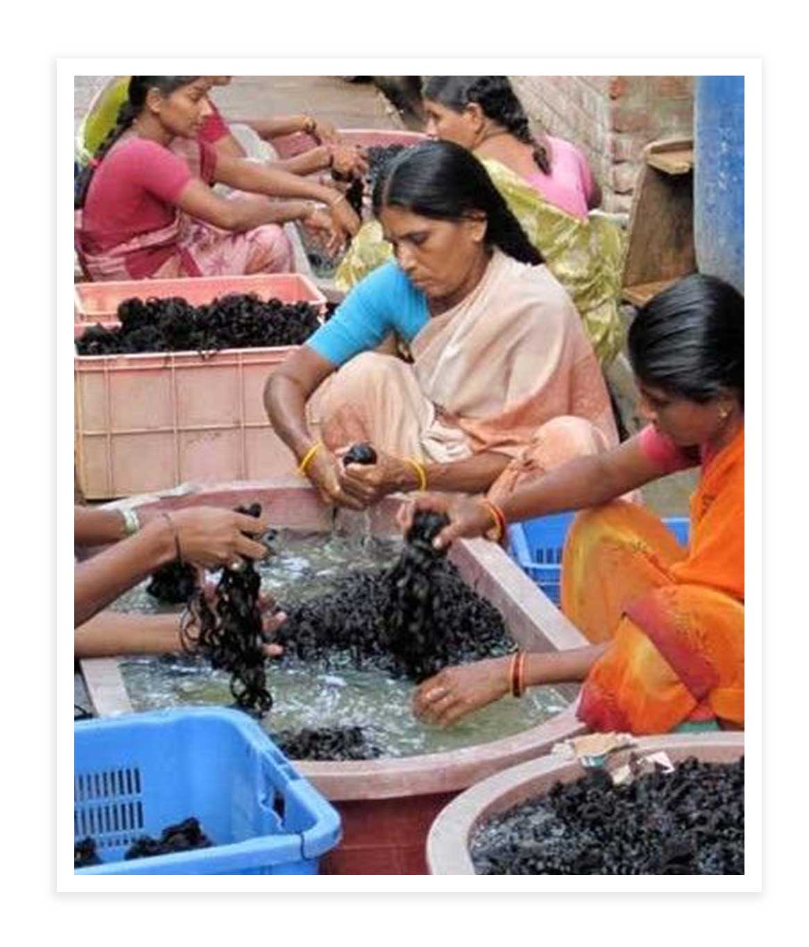 women washing hair extensions in india
