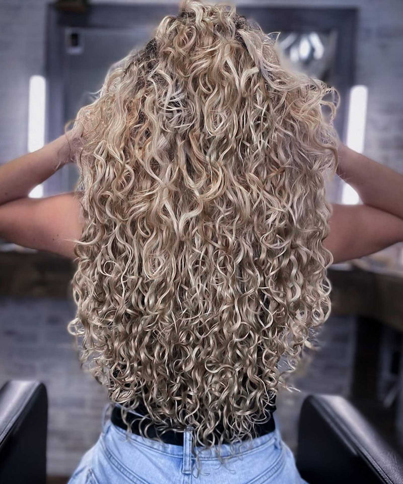 ash blonde (60) curly tape in hair extensions by Perfect Locks