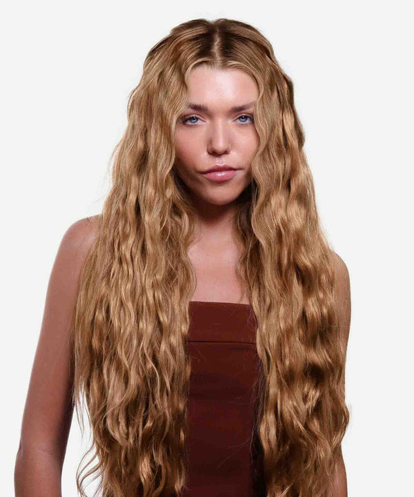 honey blonde (27) curly tape in hair extensions by Perfect Locks