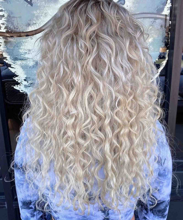 ice blonde (60S) curly tape in hair extensions by Perfect Locks