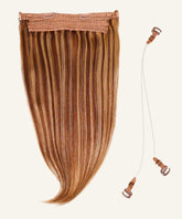 The Perfect Locks Straight Perfect Crown Hair Extensions in toffee blonde highlights attached to a fabric strip with clips, shown beside two clear elastic bands with brown clasps.#color_toffee-blonde-highlights-(4/27)