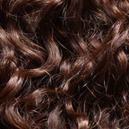 Close-up of shiny, wavy brown hair strands, showcasing detailed texture and natural highlights with a vibrant sheen.
