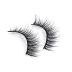 Voluminous false eyelashes enhance natural beauty, bringing a bold, dramatic touch to any makeup look.
