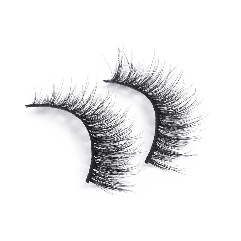 Voluminous false eyelashes enhance natural beauty, bringing a bold, dramatic touch to any makeup look.