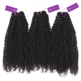 Three bundles of tightly coiled, curly black hair extensions with vibrant purple and gold tags on a white background.