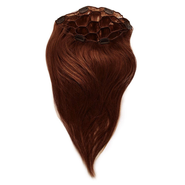 A brown hair extension with a netted, circular base and secure clips adds volume or length, blending easily for everyday use.
