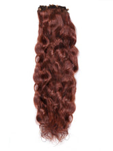 The Perfect Locks Wavy Beaded Weft in 20"  dark auburn shows long, wavy, shiny reddish-brown extensions clipped at the top.#color_dark-auburn-(33)